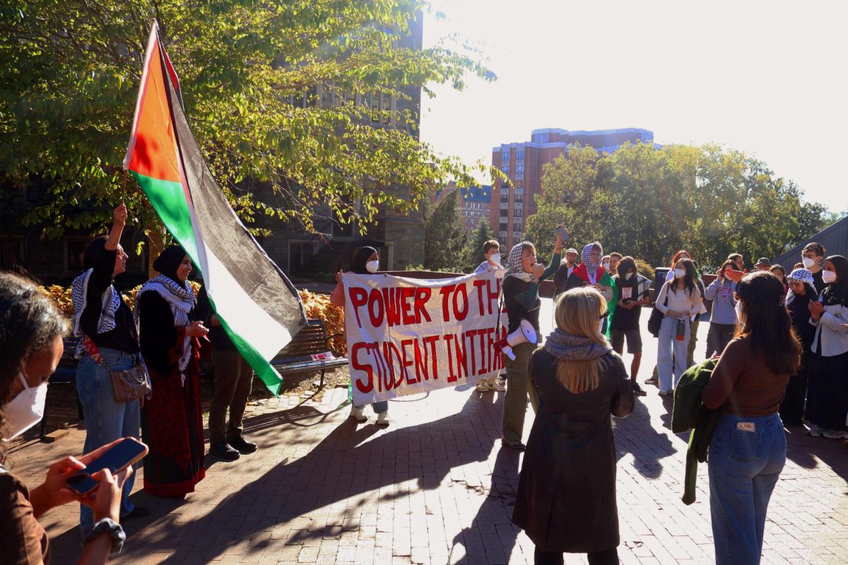 Sixty Georgetown University students rallied in Red Square Oct. 9 to demand the university divest from companies associated with Israel and the Israeli military.
