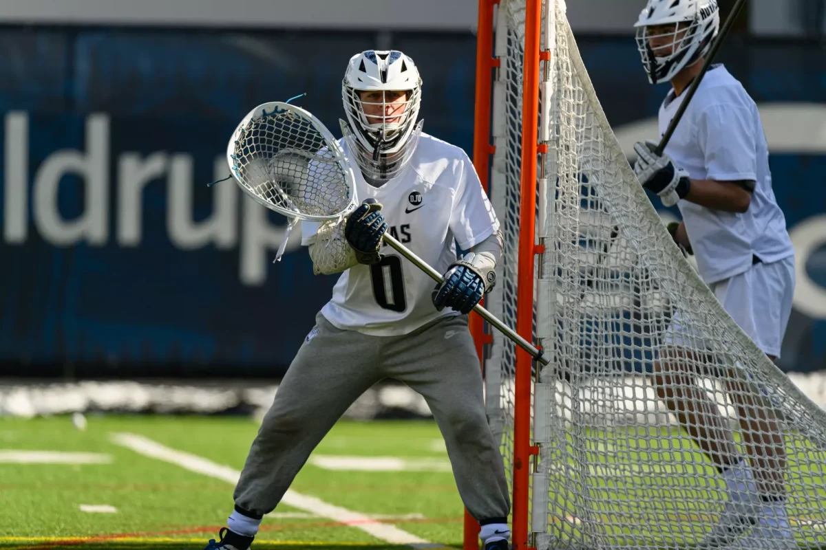 Anderson Moore (above) notched 11 saves in the Hoyas' season-opening win against Penn.