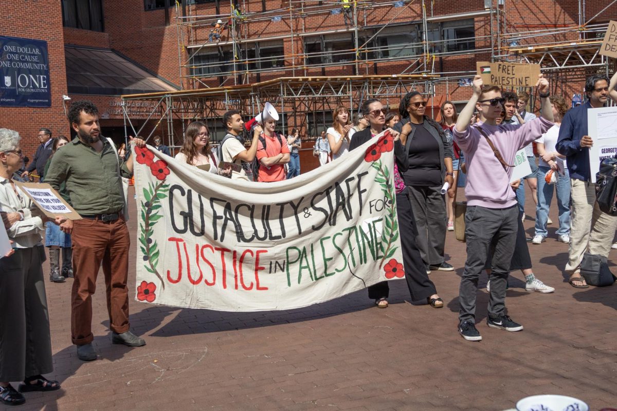Georgetown University community members gathered in Red Square on March 26 to protest the university’s investment in the ongoing Israel-Hamas war and U.S. involvement in the region. 